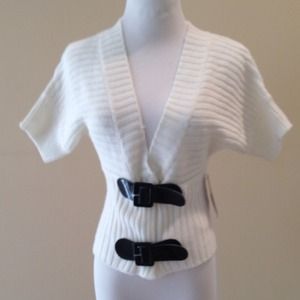 Dolman cardigan cream with black buckles