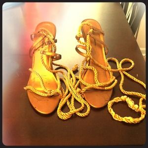 Bronze ankle wrap heels.