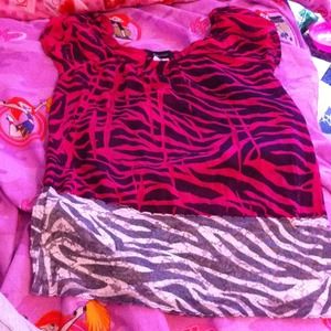 Pink zebra print shirt, white and gray at bottom