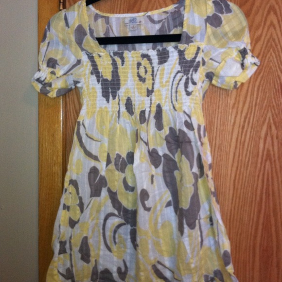 Yellow/gray/white top.