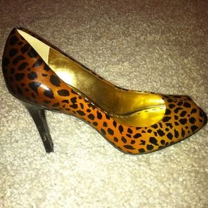 Leopard print peep toe pumps