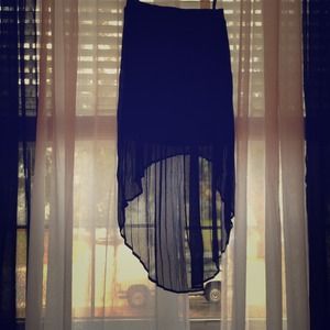 Black pleated high-low skirt