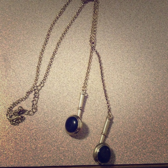 Gold colored headphone necklace