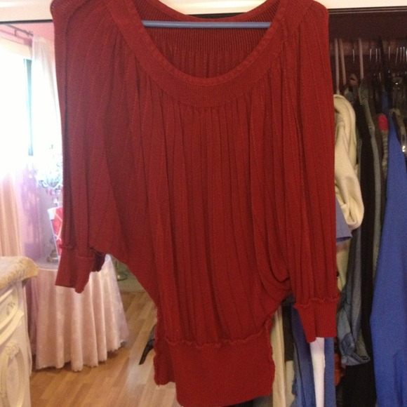 Red/burgandyishh shirt.
