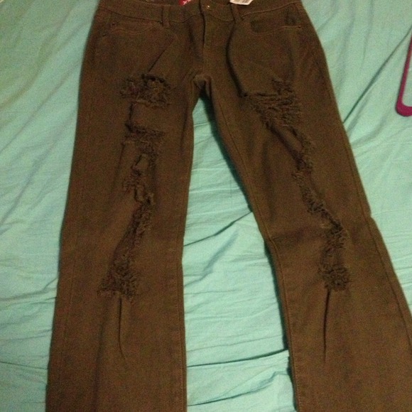 Olive green ripped skinny jeans