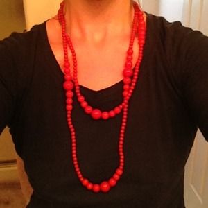 Long red beaded necklace