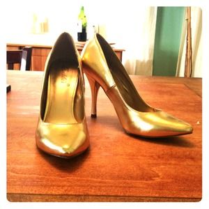Gold pointed toe pumps