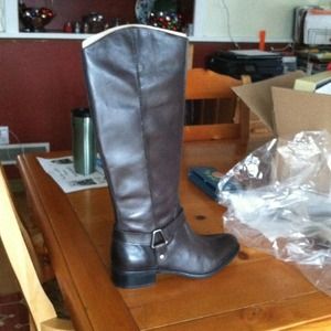 Brand new tall leather boots.