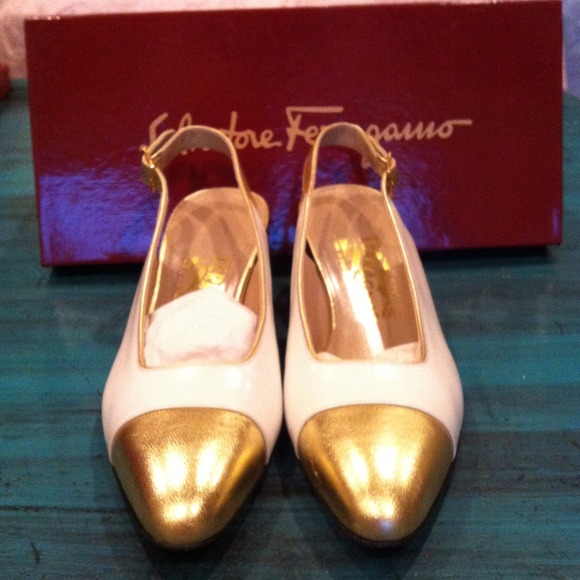 SOLD!!Gorgeous ferragamo! White with gold!