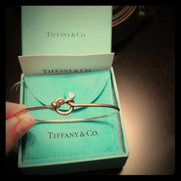 Authentic Tiffany's heart knot braclet with gold
