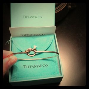 Authentic Tiffany's heart knot braclet with gold