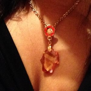 Gold necklace with orange stones