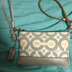 Beige coach wristlet