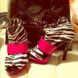 Zebra print with red strap