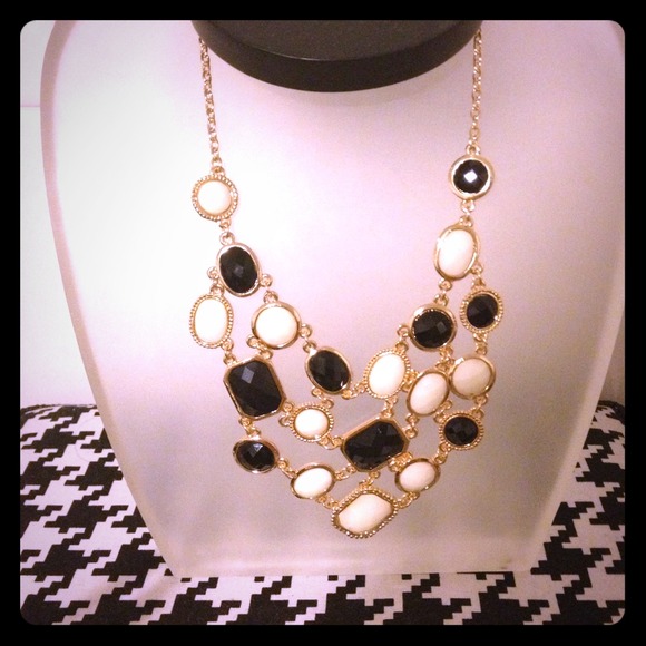 Black and cream with gold setting