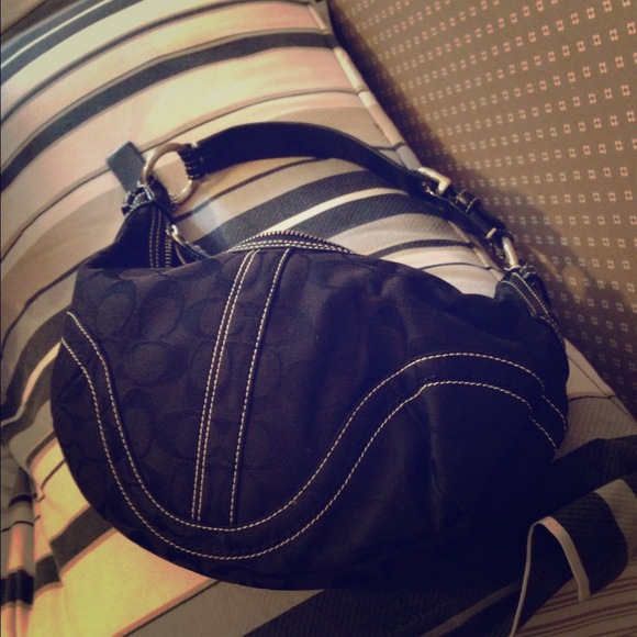 Black coach bag, yes it's real and not fake.