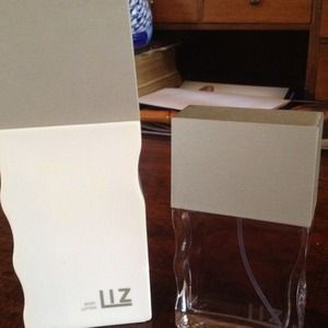 On hold Liz perfume never been used
