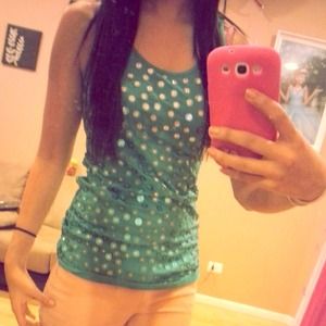 Sparkly teal tank top.
