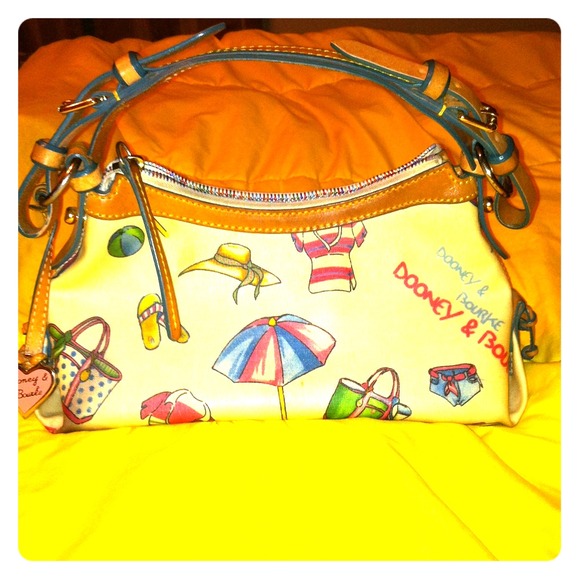 **S O L D** Dooney & Bourke