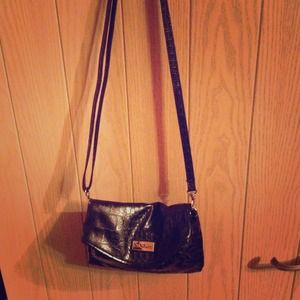 NINE & co small handbag with long strap.
