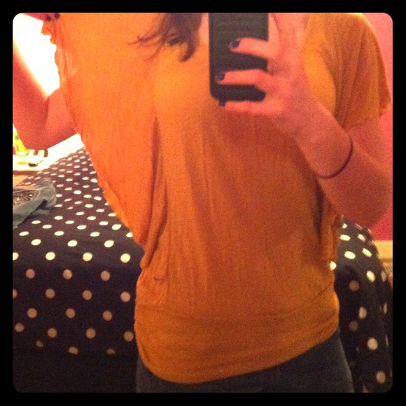 Mustard colored shirt with flowy sleeves