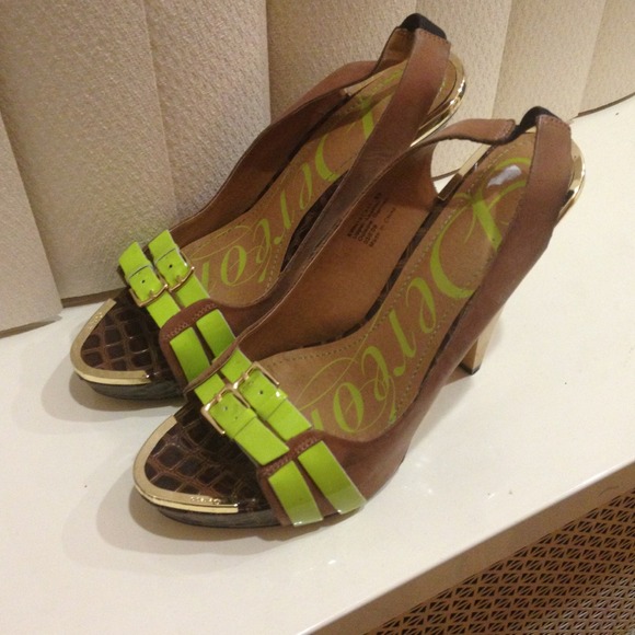 Slightly worn "Dereon" wedges by Tina Knowles.