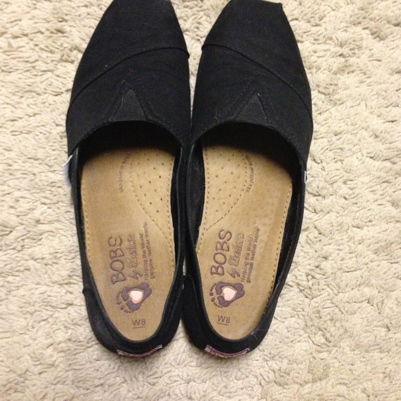 Black Canvas Bobs with pillow at the arch. Comfy!