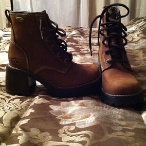 Reserved: Brown boots by Skechers