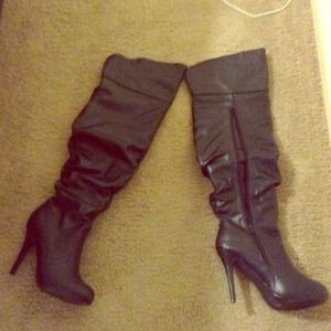 Black leather knee-high boots
