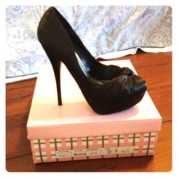 Black satin platform pumps