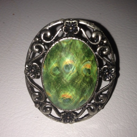 Adjustable, peacock ring.