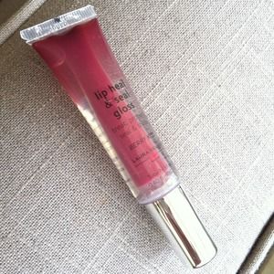 Laura Geller Lip Heal & Seal Gloss in Berry Kiss