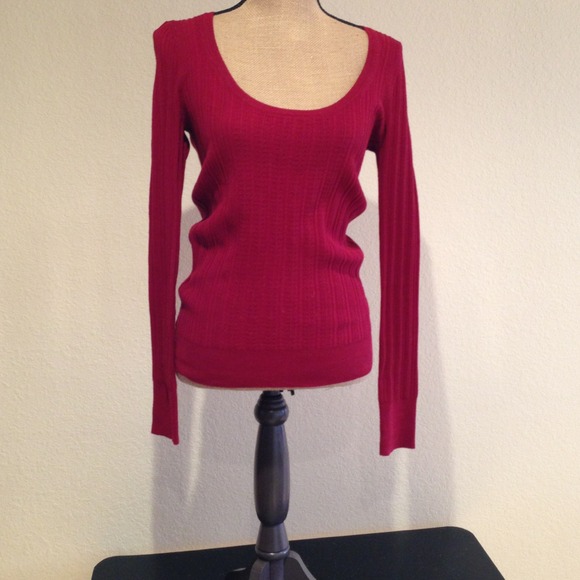 Red ribbed sweater.