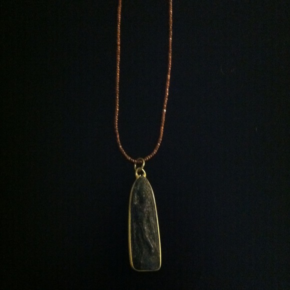 Long necklace with antique stone