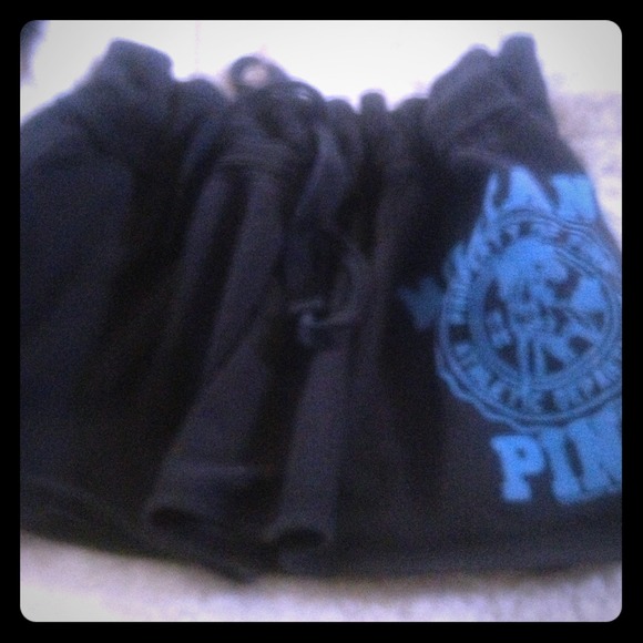 Black skirt or cover up with blue lettering