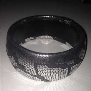 Black and silver snake skin bracelet.
