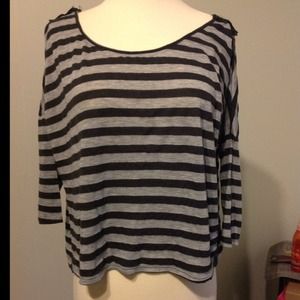 Striped baggy grey, black shirt.