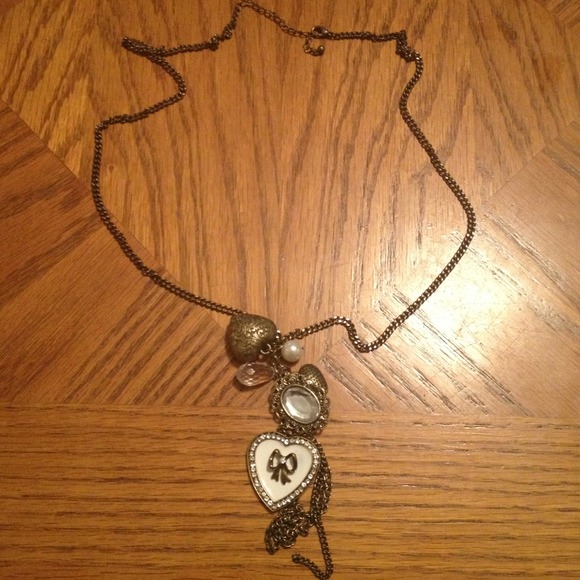 Heart and bow necklace