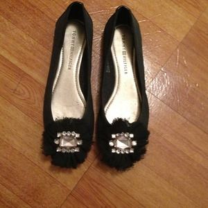 Black embellished flats.