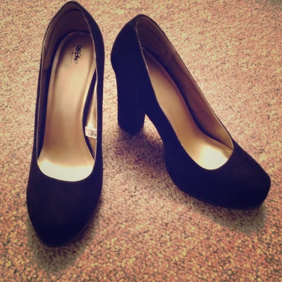 Never worn black heels.