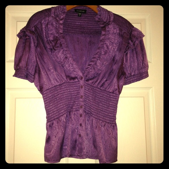Bebe silk top button up with deep v neck size med.