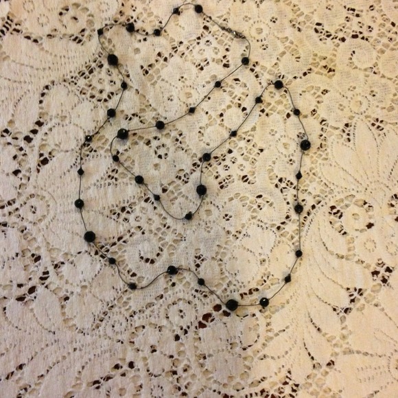 Long necklace with multi size black beads!