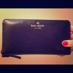 Kate Spade leather continental zip around wallet.