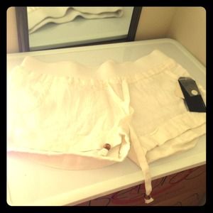 White mini shorts.