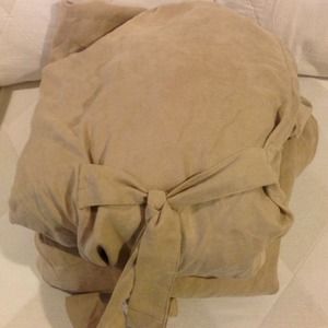 2 Love seat covers. Brand New. Color Taupe.