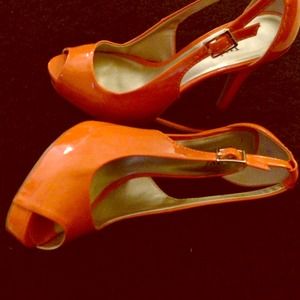 Orange heels with peep toe size 8.