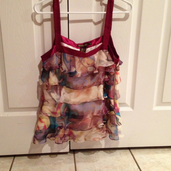 **Sold**Colorful shirt with ruffles