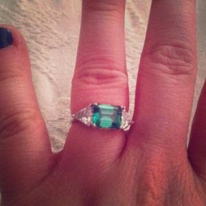 Silver emerald and diamond ring.