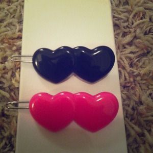 Bundle of hair barrettes, hair spray and headband