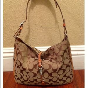 **RESERVE for Nikella**Authentic Coach Purse